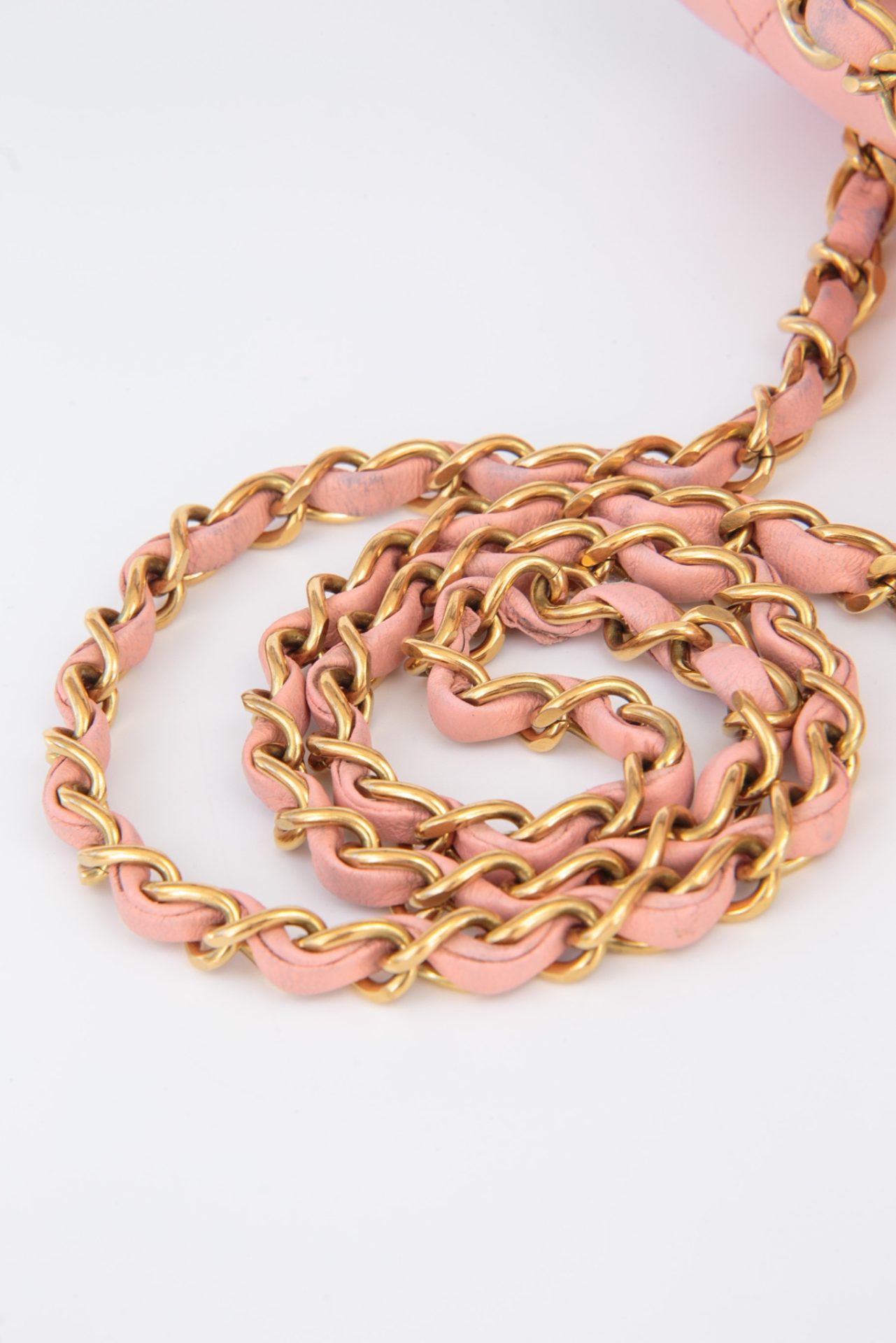 chanel chain with gold hardware and pink lambskin leather