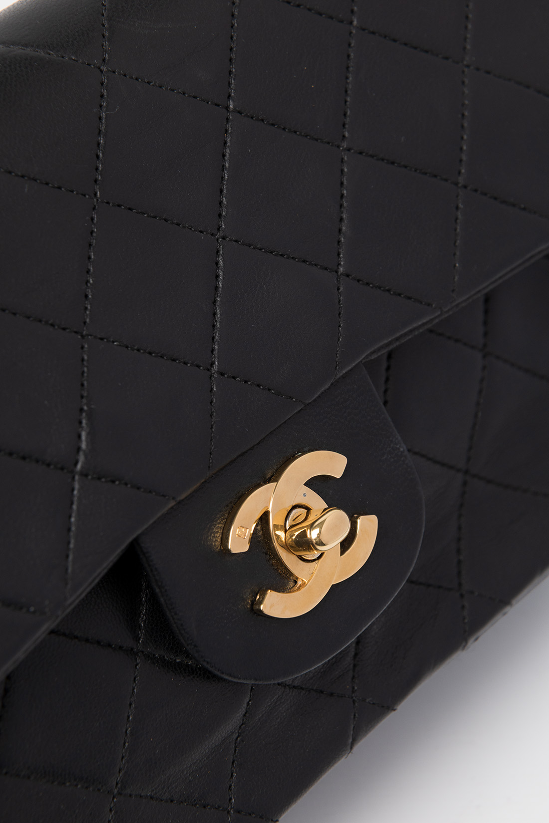 chanel gold logo turnlock